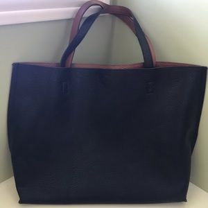 Reversible faux leather tote